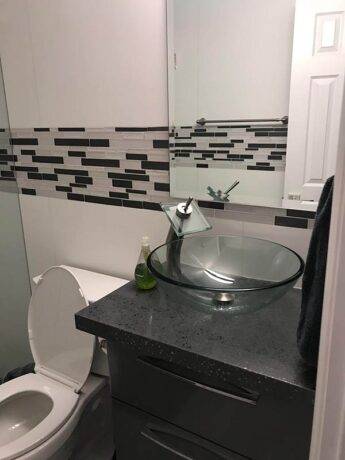 Bathroom remodeling in Coral Springs with modern glass bowl facet